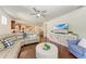 Open living space is great for entertaining and showcases dark wood flooring at 7572 Viola Loop, Lakewood Ranch, FL 34202
