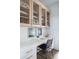Home office with built-in cabinetry and a workspace at 9973 Key Haven Rd, Seminole, FL 33777