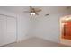 Bedroom with double closets and kitchen access at 1542 Oak St # 6, Sarasota, FL 34236