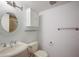 Clean bathroom with a sink, toilet, shower, and vanity at 1542 Oak St # 6, Sarasota, FL 34236