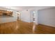 Hardwood floor living room, open to kitchen and laundry at 1542 Oak St # 6, Sarasota, FL 34236