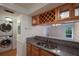 Kitchen with granite countertops, double sink, and wood cabinets at 1542 Oak St # 6, Sarasota, FL 34236