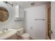 Clean bathroom with a sink, toilet, shower, and vanity at 1542 Oak St # 6, Sarasota, FL 34236