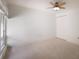 Bedroom with ceiling fan and window view at 1542 Oak St # 6, Sarasota, FL 34236