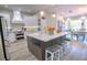 Bright kitchen featuring an island and stainless steel appliances at 408 Bailey Rd, Venice, FL 34292