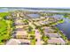 Aerial view of a luxury waterfront community with many homes and canals at 5120 Tidewater Preserve Blvd, Bradenton, FL 34208