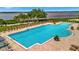 Relaxing community pool with plenty of lounge chairs and a waterfront view at 5120 Tidewater Preserve Blvd, Bradenton, FL 34208