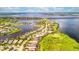 Wide aerial view of a waterfront community with a variety of homes at 5120 Tidewater Preserve Blvd, Bradenton, FL 34208