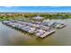 Aerial view of community marina with many boats at 5120 Tidewater Preserve Blvd, Bradenton, FL 34208