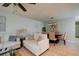 Open living room and dining area with tile floors and ceiling fan at 3447 Tallywood Ln # 7143, Sarasota, FL 34237
