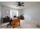 Spacious home office with desk, chair, and natural light at 3447 Tallywood Ln # 7143, Sarasota, FL 34237
