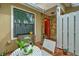 Inviting patio with brick pavers, small table, chairs, and potted plants at 3447 Tallywood Ln # 7143, Sarasota, FL 34237
