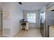 Kitchen nook with window seat and built-in shelving at 3447 Tallywood Ln # 7143, Sarasota, FL 34237