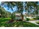 Well-maintained home with lush landscaping and walkway at 3447 Tallywood Ln # 7143, Sarasota, FL 34237