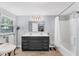 Double vanity bathroom with a shower/tub combo and updated fixtures at 401 28Th W St, Bradenton, FL 34205