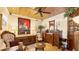 Elegant antique furniture adorns this charming room, creating a sophisticated ambiance at 401 28Th W St, Bradenton, FL 34205