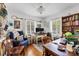 Bright home office features hardwood floors, and ample built-in shelving at 401 28Th W St, Bradenton, FL 34205