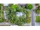 Property overview showing home's location in a tree-lined neighborhood at 401 28Th W St, Bradenton, FL 34205