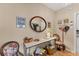 Bright entryway with a console table, mirror, and vintage decor at 401 28Th W St, Bradenton, FL 34205