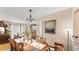 Bright dining room featuring a wooden table, chairs, and a beautiful chandelier at 401 28Th W St, Bradenton, FL 34205