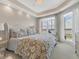 Spacious main bedroom with water views and comfortable bed at 10520 Boardwalk Loop # 605, Lakewood Ranch, FL 34202