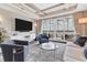 Bright living room with large windows and water views at 10520 Boardwalk Loop # 605, Lakewood Ranch, FL 34202