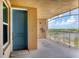 Private condo entry with balcony access and lake view at 10520 Boardwalk Loop # 605, Lakewood Ranch, FL 34202