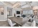 Open concept dining area and living room with water views at 10520 Boardwalk Loop # 605, Lakewood Ranch, FL 34202