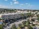 Community shopping center with palm trees and fountain at 10520 Boardwalk Loop # 605, Lakewood Ranch, FL 34202