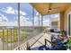 Peaceful screened balcony offering stunning lake views at 10520 Boardwalk Loop # 605, Lakewood Ranch, FL 34202
