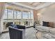 Relaxing living room with water views and comfortable seating at 10520 Boardwalk Loop # 605, Lakewood Ranch, FL 34202