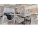 Open concept dining area with stunning water views at 10520 Boardwalk Loop # 605, Lakewood Ranch, FL 34202