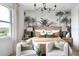 Main bedroom with a king-size bed and tropical-themed wall at 9975 Key Haven Rd, Seminole, FL 33777