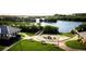 Community firepit and waterfront seating area with access to the water at 9973 Key Haven Rd, Seminole, FL 33777