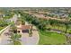 Aerial view of the Esplanade community entrance with manicured landscaping and palm trees at 12663 Fontana Loop, Bradenton, FL 34211