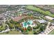 Aerial view of the community pool and amenities including tennis and clubhouse at 12663 Fontana Loop, Bradenton, FL 34211