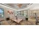 Bright living room with comfortable seating, large windows, and open layout at 12663 Fontana Loop, Bradenton, FL 34211