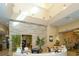 Elegant reception area with modern decor, stylish lighting, and welcoming atmosphere for residents and guests at 12663 Fontana Loop, Bradenton, FL 34211
