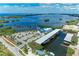 Aerial view of the community marina, boat storage and parking, with a bay view at 264 Woods Point Rd, Osprey, FL 34229