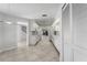 Bright kitchen with white cabinets, tile floors, and stainless steel appliances at 264 Woods Point Rd, Osprey, FL 34229