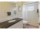 Bathroom with a granite vanity and a shower at 5071 Village Gardens Dr # 5, Sarasota, FL 34234