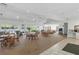 Spacious clubhouse featuring tables and chairs, perfect for community gatherings at 5071 Village Gardens Dr # 5, Sarasota, FL 34234