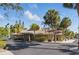 Community clubhouse featuring a well-manicured landscape with plenty of palms at 5071 Village Gardens Dr # 5, Sarasota, FL 34234