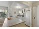Kitchen featuring laminate countertops and white appliances at 5071 Village Gardens Dr # 5, Sarasota, FL 34234
