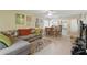 Open concept living and dining area featuring a kitchen at 5071 Village Gardens Dr # 5, Sarasota, FL 34234