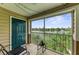 Screened balcony overlooking a lake with fountain view at 8905 Manor Loop # 205, Lakewood Ranch, FL 34202