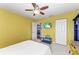 Bright bedroom with double closets and view into living area at 8905 Manor Loop # 205, Lakewood Ranch, FL 34202
