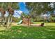 playground with swings and slides at 8905 Manor Loop # 205, Lakewood Ranch, FL 34202