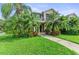Beautiful two-story home with lush landscaping at 8905 Manor Loop # 205, Lakewood Ranch, FL 34202