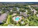 Community overview with pool, spa, and surrounding landscape at 8905 Manor Loop # 205, Lakewood Ranch, FL 34202